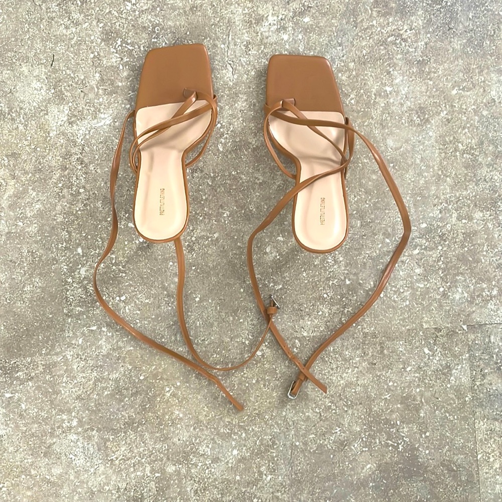 Light brown, skinny high heel with straps. Size 5 Women UK and 7 in Women’s US.